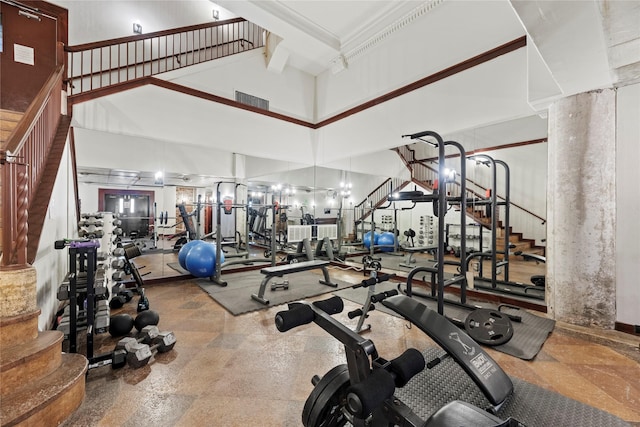 2205 Mckinney St Unit 405, Houston, TX 77003 - workout area with a towering ceiling