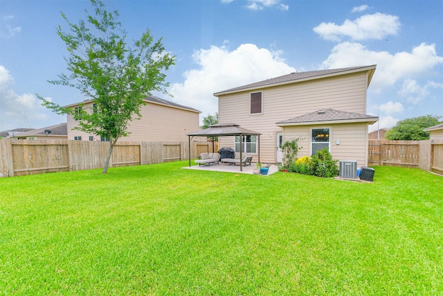 4719 Redbud Place Ln, Richmond, TX 77469 - rear view of house featuring a gazebo, cooling unit, an outdoor living space, and a patio area