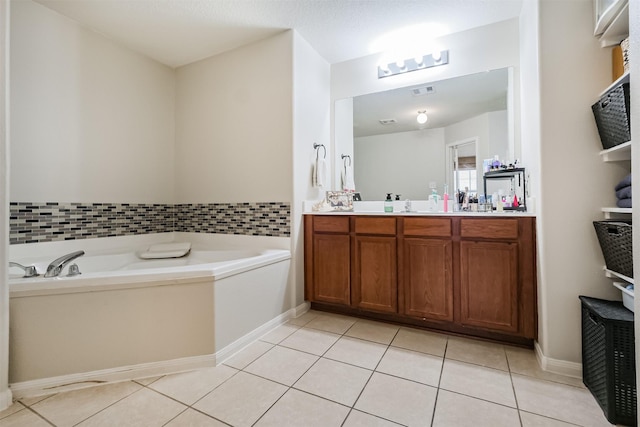 4719 Redbud Place Ln, Richmond, TX 77469 - bathroom featuring vanity, tile patterned floors, a bath, and baseboards