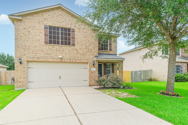 4719 Redbud Place Ln, Richmond, TX 77469 - traditional-style home featuring an attached garage, brick siding, and driveway