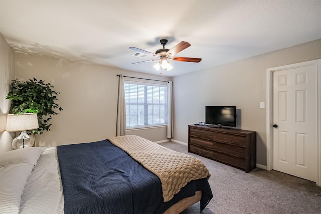 4719 Redbud Place Ln, Richmond, TX 77469 - bedroom featuring light carpet, a ceiling fan, and baseboards