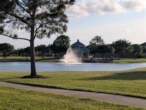 4719 Redbud Place Ln, Richmond, TX 77469 - surrounding community with a water view and a lawn