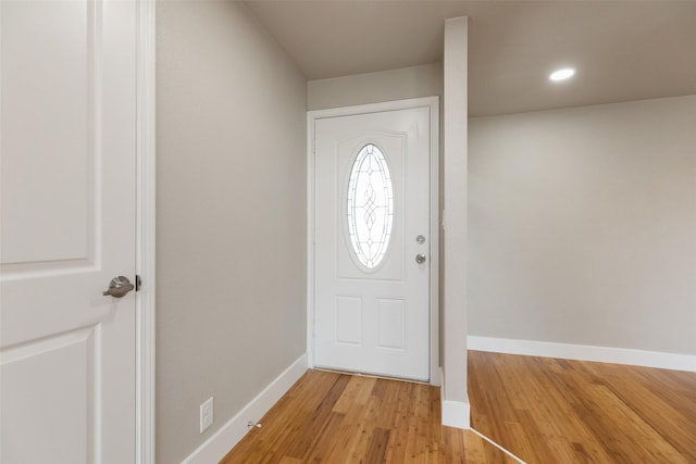 12406 Whittington Dr, Houston, TX 77077 - entrance foyer with light wood-type flooring, baseboards, and recessed lighting