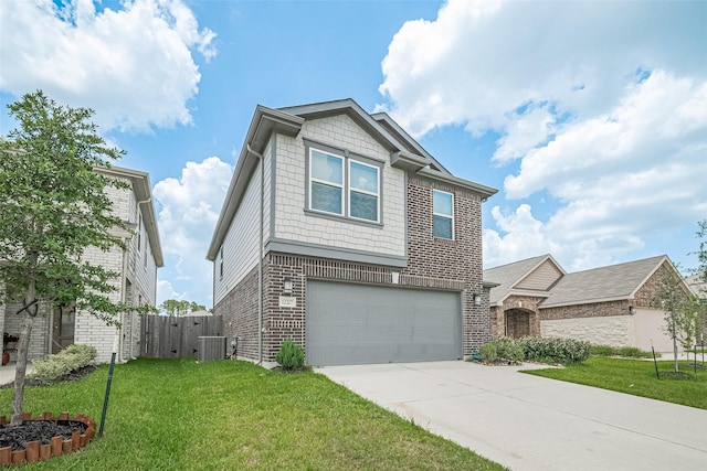 12327 Buck Sable Ln, Houston, TX 77044 - view of front of house with concrete driveway, a garage, and brick siding