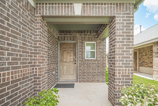 12327 Buck Sable Ln, Houston, TX 77044 - doorway to property with brick siding