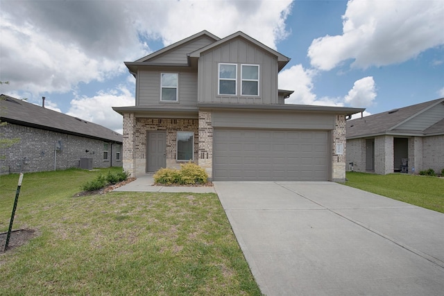 5451 Portwood Acres Dr, Spring, TX 77373 - view of front of house with board and batten siding, concrete driveway, an attached garage, and a front yard