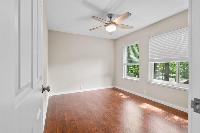 161 Litchfield Ln, Houston, TX 77024 - spare room with dark wood-style flooring and a ceiling fan