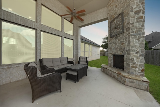 21015 Arden Park Dr, Richmond, TX 77407 - view of patio / terrace featuring ceiling fan and an outdoor living space with a fireplace