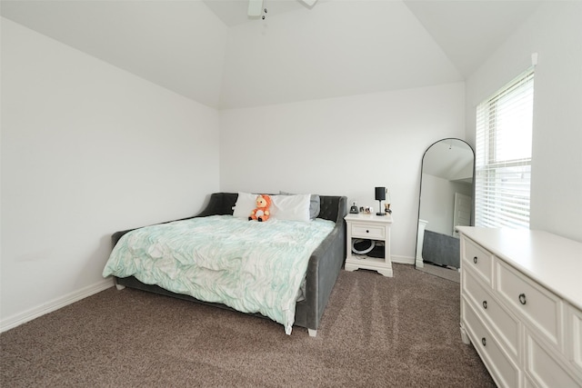 21015 Arden Park Dr, Richmond, TX 77407 - bedroom featuring lofted ceiling, dark carpet, baseboards, and a ceiling fan