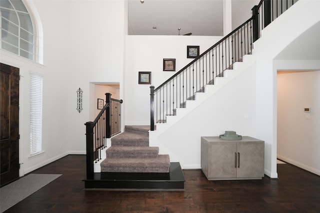 21015 Arden Park Dr, Richmond, TX 77407 - entrance foyer with a towering ceiling, baseboards, stairway, and wood finished floors