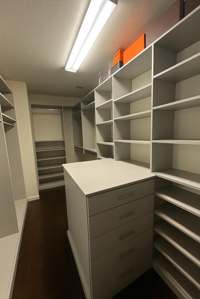 21015 Arden Park Dr, Richmond, TX 77407 - spacious closet with dark wood finished floors