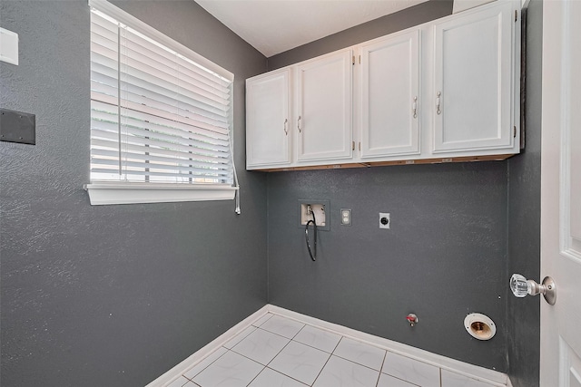 3718 Sweetgum Hill Ln, Houston, TX 77345 - laundry area with washer hookup, gas dryer hookup, cabinet space, baseboards, and electric dryer hookup