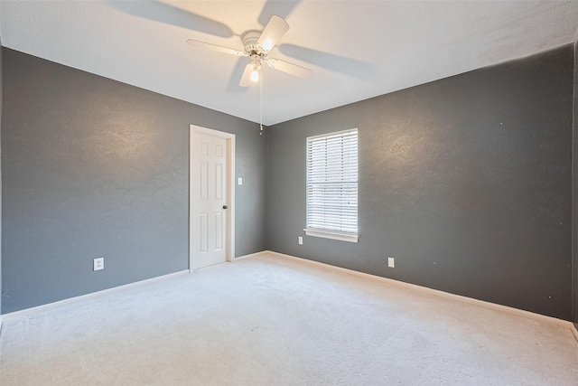 3718 Sweetgum Hill Ln, Houston, TX 77345 - carpeted empty room with ceiling fan, baseboards, and a textured wall