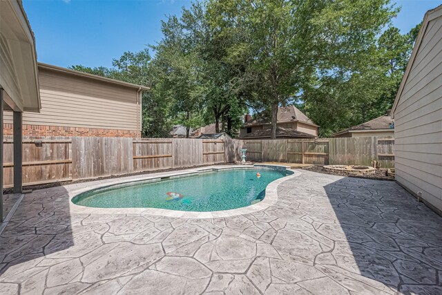3718 Sweetgum Hill Ln, Houston, TX 77345 - view of pool featuring a patio area and a fenced backyard