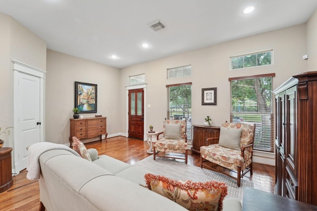 121 E 22nd St, Houston, TX 77008 - living area featuring light wood-style floors and recessed lighting