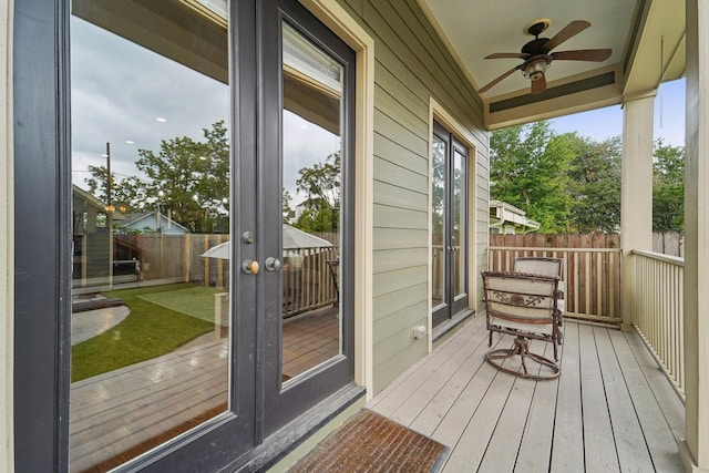 121 E 22nd St, Houston, TX 77008 - wooden terrace featuring french doors, a fenced backyard, and a ceiling fan
