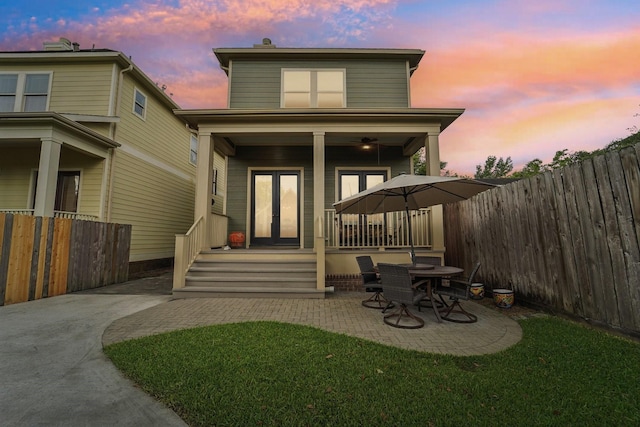 121 E 22nd St, Houston, TX 77008 - back of house featuring french doors, a patio, and covered porch