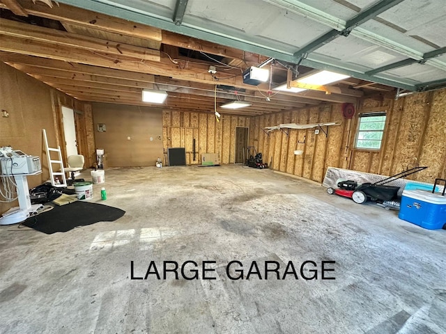 3319 Trent Rd, Huffman, TX 77336 - garage featuring a garage door opener