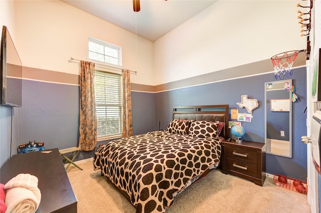 6119 Cresting Knolls Cir, Richmond, TX 77407 - carpeted bedroom with baseboards and a ceiling fan