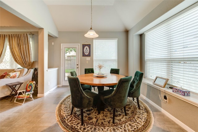6119 Cresting Knolls Cir, Richmond, TX 77407 - dining space with vaulted ceiling and light tile patterned floors