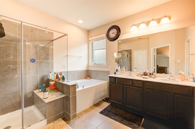 6119 Cresting Knolls Cir, Richmond, TX 77407 - full bath with a garden tub, a shower stall, tile patterned floors, and double vanity