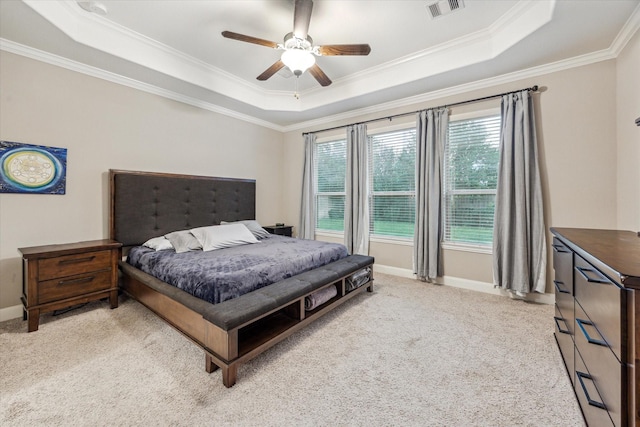 6815 Cottonwood Crest Ln, Katy, TX 77493 - bedroom featuring a raised ceiling, ornamental molding, light carpet, baseboards, and ceiling fan