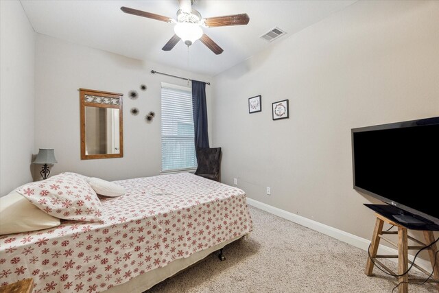 6815 Cottonwood Crest Ln, Katy, TX 77493 - carpeted bedroom featuring baseboards and a ceiling fan