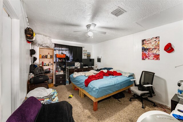 7322 Crownwest St Unit 7322, Houston, TX 77072 - carpeted bedroom with a textured ceiling and a ceiling fan