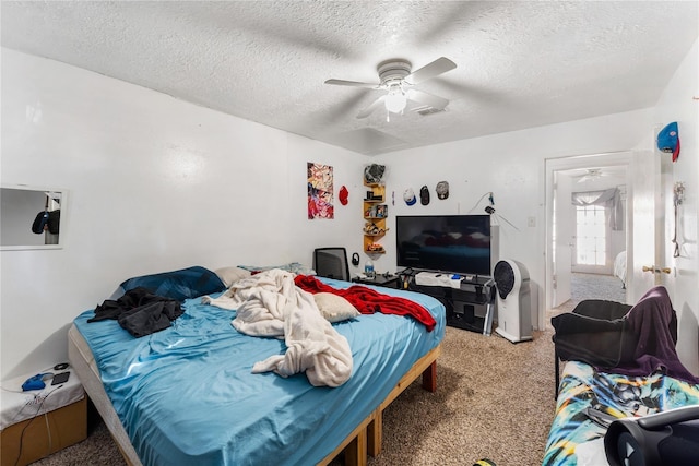 7322 Crownwest St Unit 7322, Houston, TX 77072 - carpeted bedroom with a textured ceiling and ceiling fan