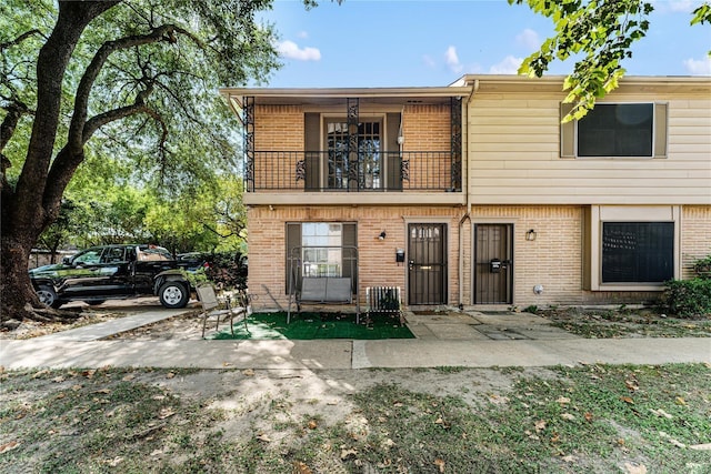 7322 Crownwest St Unit 7322, Houston, TX 77072 - multi unit property with a balcony and brick siding