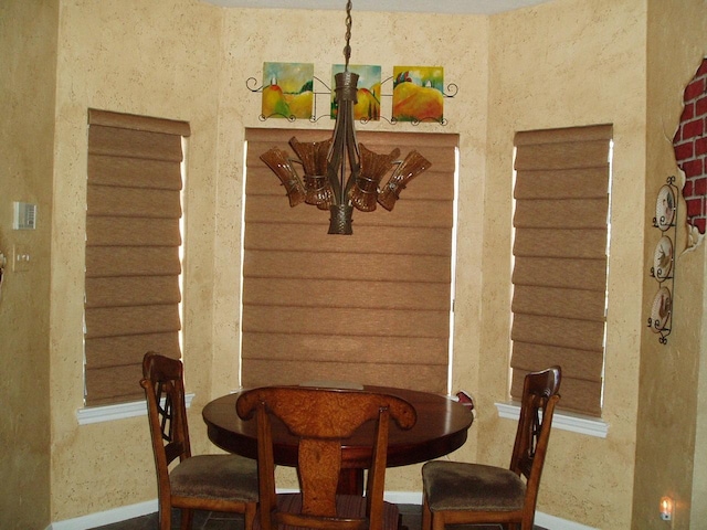 15014 Redbud Leaf Ln, Cypress, TX 77433 - dining room featuring a chandelier and baseboards