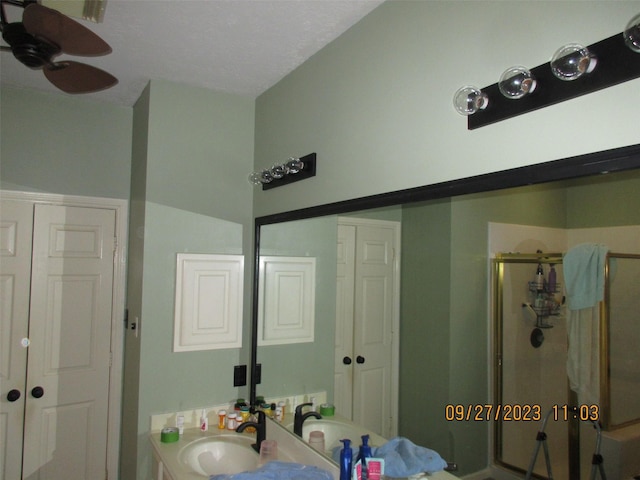 15014 Redbud Leaf Ln, Cypress, TX 77433 - full bathroom featuring ceiling fan, a shower stall, vanity, and a closet