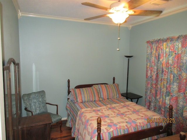 15014 Redbud Leaf Ln, Cypress, TX 77433 - bedroom with ornamental molding, wood finished floors, and a ceiling fan