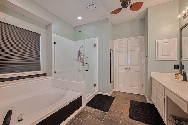 15014 Redbud Leaf Ln, Cypress, TX 77433 - full bathroom with a shower stall, a jetted tub, vanity, and a ceiling fan