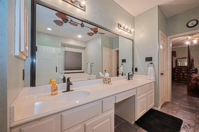 15014 Redbud Leaf Ln, Cypress, TX 77433 - full bathroom with ceiling fan, double vanity, a stall shower, and stone tile flooring