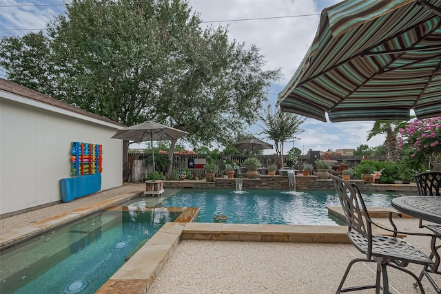 15014 Redbud Leaf Ln, Cypress, TX 77433 - view of pool with a fenced backyard, a patio area, and a pool with connected hot tub