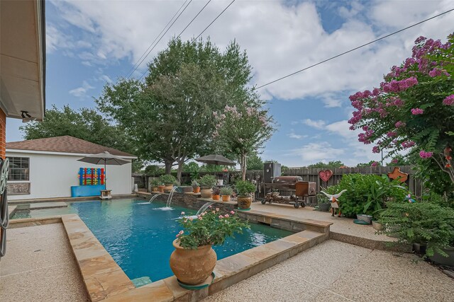 15014 Redbud Leaf Ln, Cypress, TX 77433 - view of swimming pool with a patio area and a fenced backyard