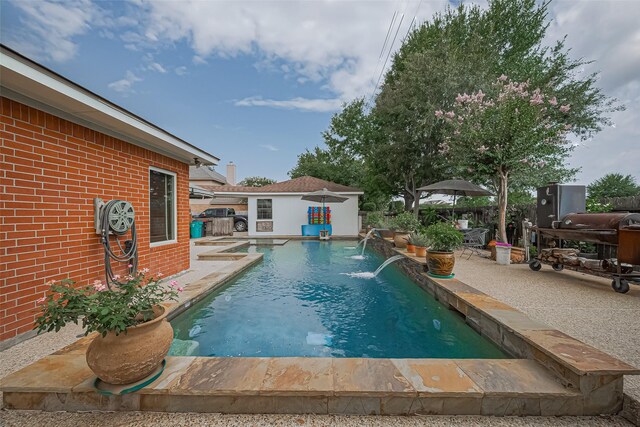15014 Redbud Leaf Ln, Cypress, TX 77433 - view of pool featuring a patio and an outbuilding