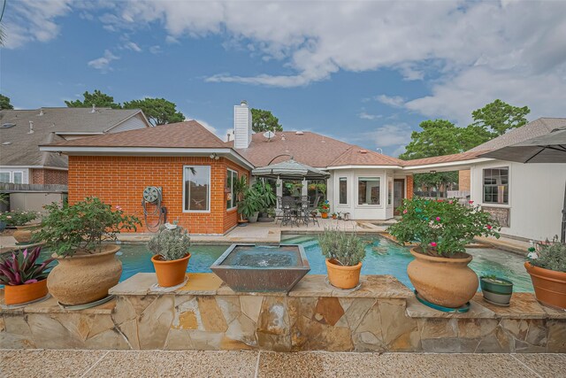 15014 Redbud Leaf Ln, Cypress, TX 77433 - outdoor pool with a patio area and a gazebo