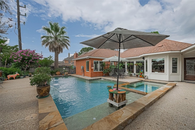 15014 Redbud Leaf Ln, Cypress, TX 77433 - view of pool with a patio, a fenced backyard, and a pool with connected hot tub