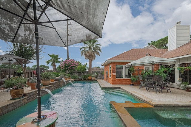 15014 Redbud Leaf Ln, Cypress, TX 77433 - view of pool with a fenced backyard, a patio area, and a pool with connected hot tub