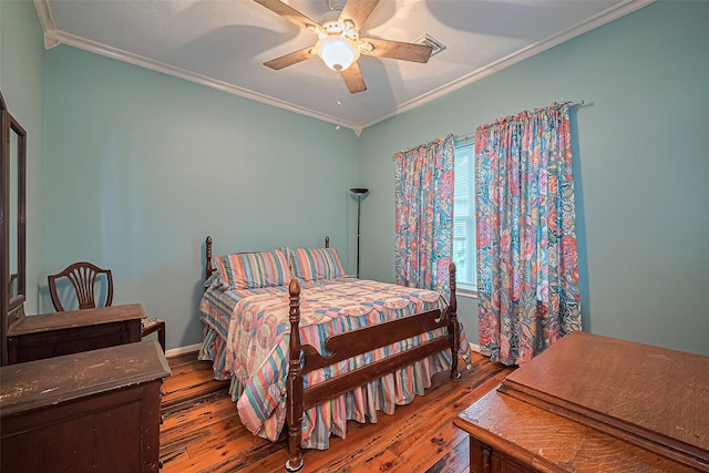 15014 Redbud Leaf Ln, Cypress, TX 77433 - bedroom with hardwood / wood-style floors, ornamental molding, and ceiling fan