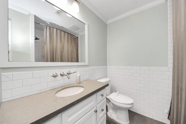 1010 Prince St, Houston, TX 77008 - full bathroom with crown molding, vanity, toilet, tile walls, and a shower with shower curtain