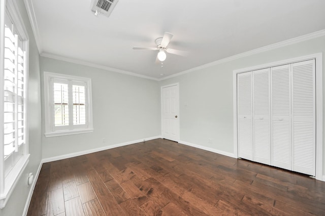 1010 Prince St, Houston, TX 77008 - unfurnished bedroom featuring crown molding, dark wood finished floors, baseboards, and ceiling fan