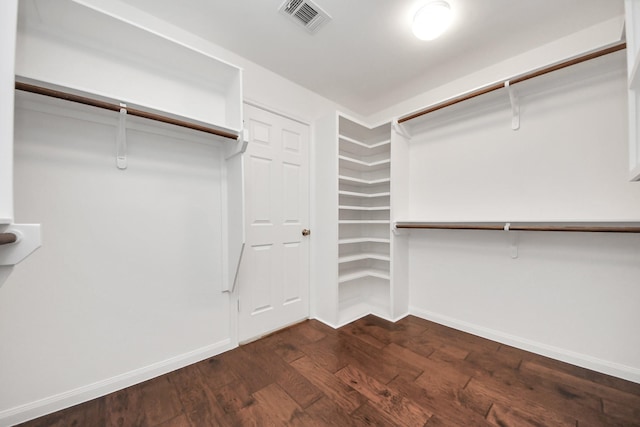 1010 Prince St, Houston, TX 77008 - spacious closet featuring dark wood finished floors