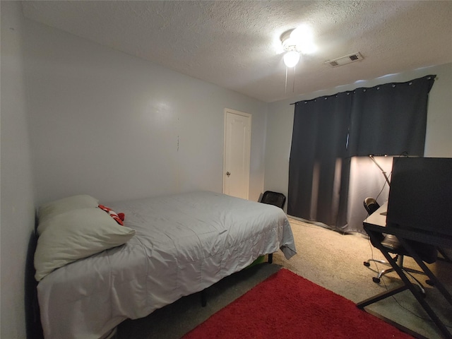 9711 Ebb St, Houston, TX 77089 - bedroom featuring carpet flooring and a textured ceiling