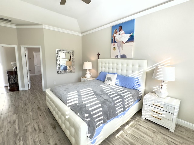 9723 Reston Ranch Ct, Cypress, TX 77433 - bedroom with wood finished floors, baseboards, crown molding, and ceiling fan