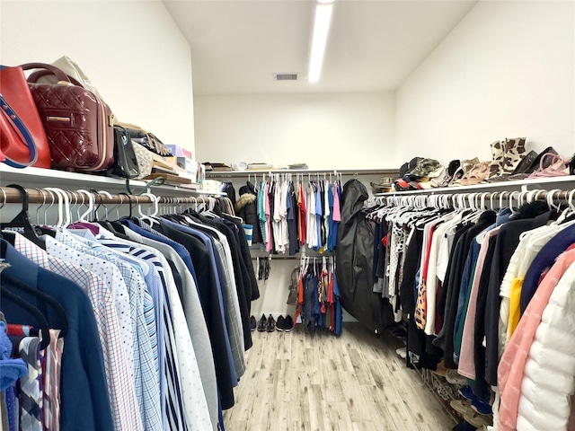 9723 Reston Ranch Ct, Cypress, TX 77433 - spacious closet featuring wood finished floors
