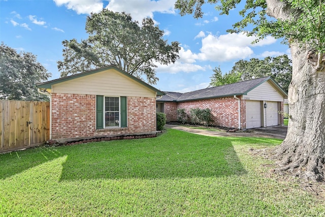 17202 Heritage Bay Dr, Webster, TX 77598 - view of yard featuring a garage and driveway