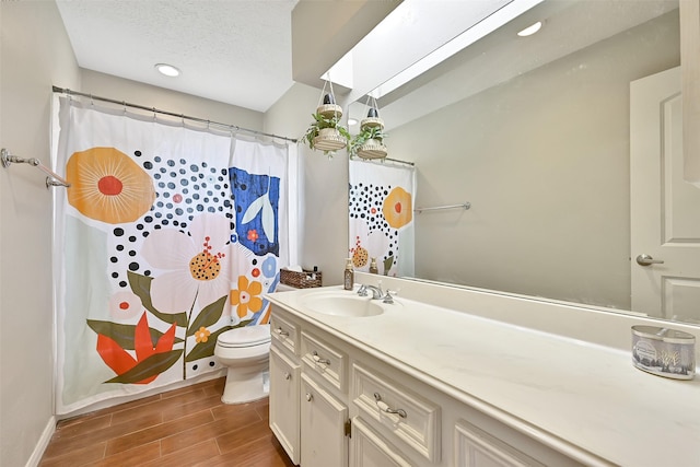 17202 Heritage Bay Dr, Webster, TX 77598 - full bathroom featuring wood finished floors, toilet, vanity, baseboards, and a shower with shower curtain